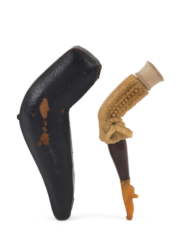 A can can dancer's leg pipe, carved meerschaum, timber and amber in original leather case, 19th century, 13cm long