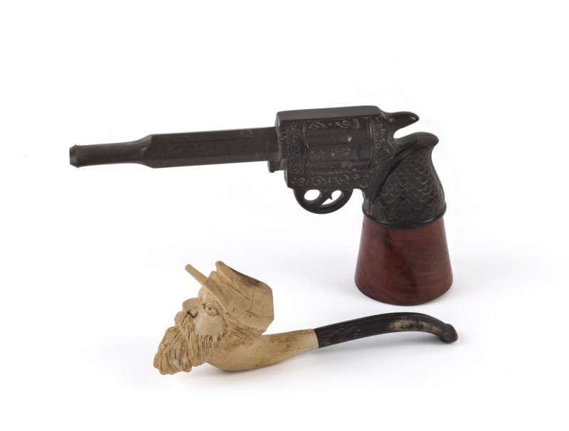 Two pipes, one in the form of a revolver, the other an American civil war soldier, 19th and early 20th century, ​12.5cm and 10cm long