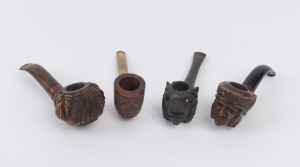 Four novelty pipes, carved timber American Indian, lion, Chinese figures and a Boer war example engraved "DIYATALAWA, BOER CAMP", 19th and 20th century, the largest 16cm long