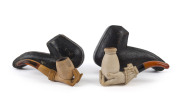 Two antique pipes, carved meerschaum in the of hands with amber mouth pieces, both in fitted cases, 19th century, 9.5cm and 10cm long