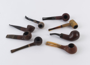 Eight assorted antique and vintage pipes including silver mounted, corn cobb, carved timber and horn, 19th and 20th century, the largest 14.5cm long