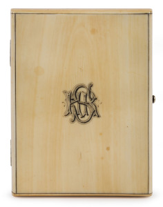 A fine ivory card case with engraved monogram "H.S.R.", interior fitted with blue silk accordion compartments, 19th century, ​11cm high