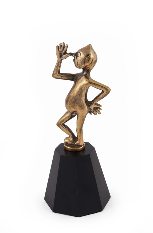 A novelty car radiator ornament, cast metal, circa 1930s, later wooden stand, 20cm high overall