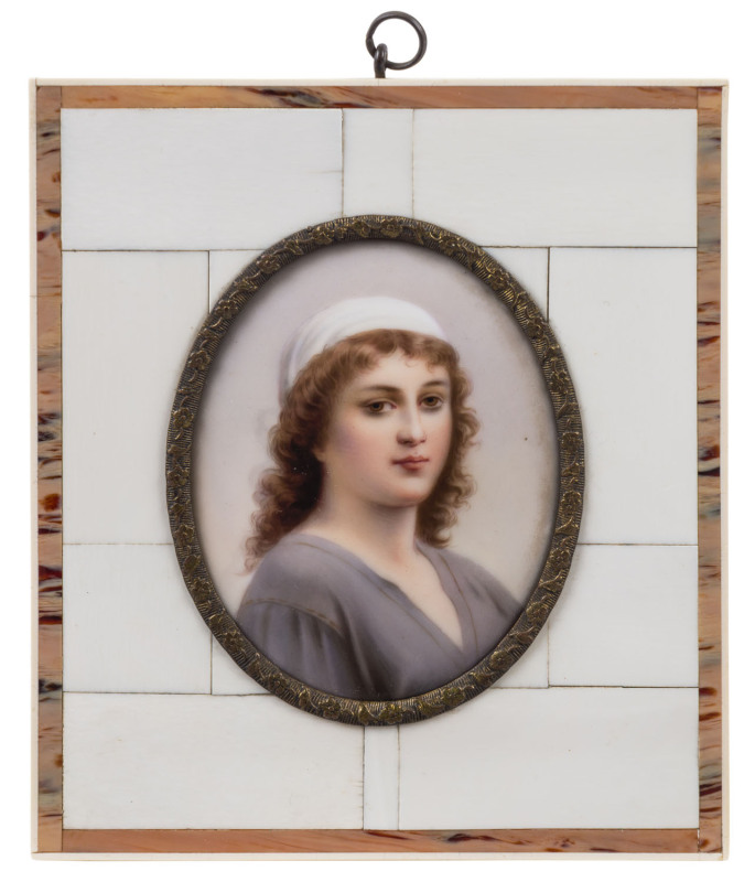 A Continental oval portrait miniature on porcelain in a piano ivory and tortoiseshell frame, 19th/20th century, 14 x 12cm overall