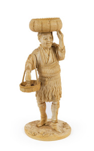 A Japanese carved ivory statue of a peasant collecting shellfish, Meiji period, 19th century, seal mark to base, ​20.5cm high