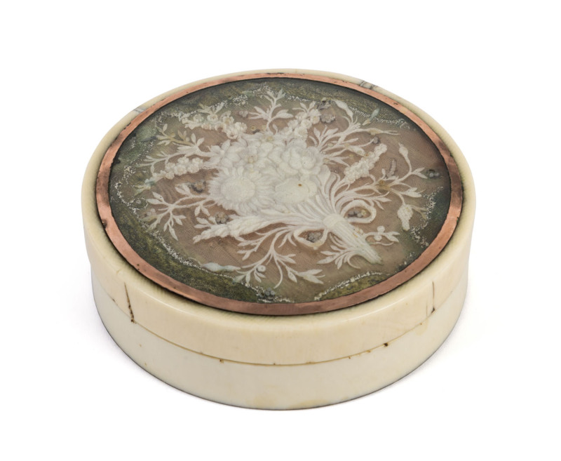 A Georgian circular snuffbox, carved ivory with tortoiseshell interior and rose gold mount, circa 1800, 8cm diameter