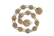 A Japanese belt set with fifteen carved ivory animal head roundels, Meiji period, late 19th century, ​80cm long
