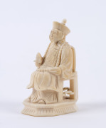 A Chinese carved ivory statue of a seated official, late 19th early 20th century, ​6cm high - 2