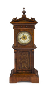 A walnut cased mantel clock in the form of a grandfather clock, most likely German, late 19th century, 31cm high