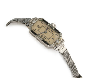 ROLEX ladies cocktail watch, platinum case with diamond and onyx bezel, steel bracelet, circa 1930's, movement stamped "Rolex Extra Prima, 15 Jewels, Swiss Made", ​case 3cm high