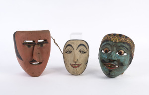 Three assorted masks, carved and painted wood, Mexican and Balinese, 20th century, the largest 20cm high