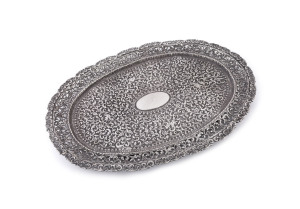 An Indian Kutch silver oval serving tray, 19th century, ​36.5cm wide, 650 grams
