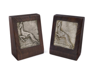 A pair of Art Deco gazelle bookends, cast metal and timber, circa 1930, 15.5cm high
