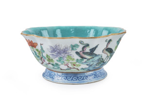 A Chinese porcelain lotus bowl with enamel decoration and turquoise glazed interior, Qing dynasty, 19th century, 8cm high, 18cm wide