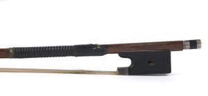 TOURTE violin bow with silver mounts, 19th century, stamped "TOURTE", ​74cm long