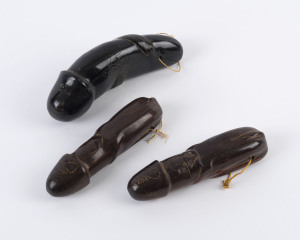 Three Bhutanese fertility idols, carved wood, 20th century, the largest 16cm long