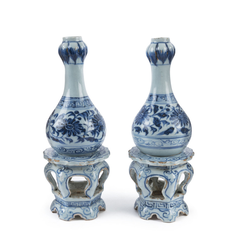 A pair of Chinese blue and white ceramic vessels on stands, 18th century, ​23.5cm high