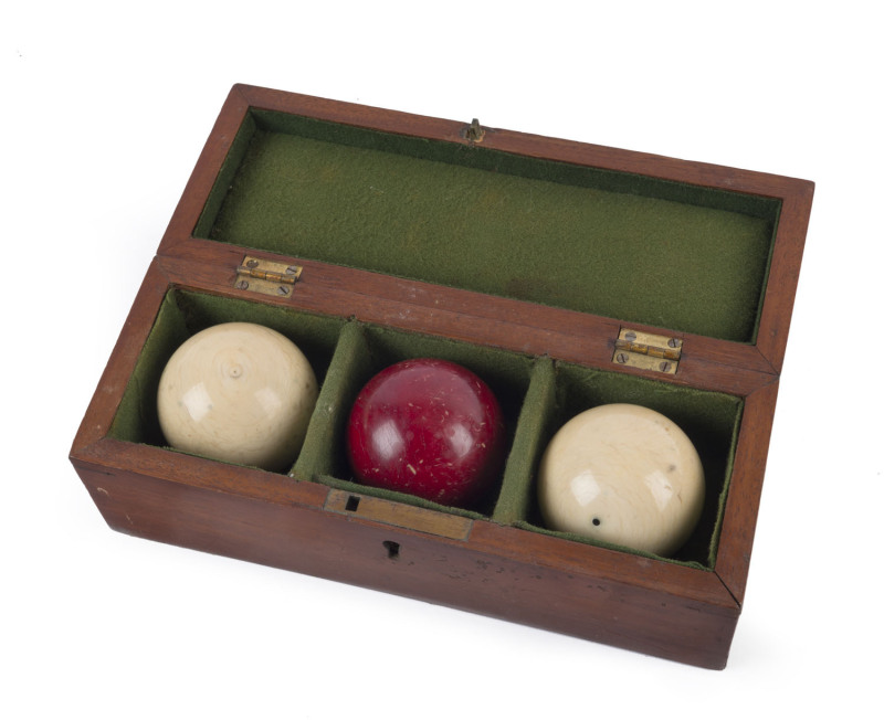 Set of antique ivory billiard balls in original mahogany box with green felt lining, 19th century, ​the box 20.5cm wide