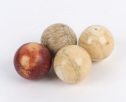 Four antique ivory billiard balls, 19th century, 