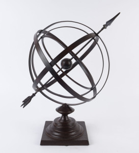 An arrow and sphere ornamental orb, bronzed forged iron, late 20th century, 52cm long