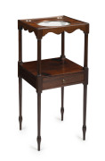 A Georgian mahogany washstand, late 18th century, later bevelled glass panel top, 77cm high, 35cm wide, 35cm deep