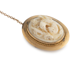 A antique brooch, 15ct gold with carved ivory panel, 19th century, stamped "15ct" 3cm high