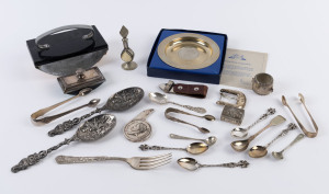 Two sterling silver sugar nips, silver vinaigrette, silver jam spoon, silver barrel salt cellar, silver belt buckle, two ink blotters, Royal wedding dish, Napoleon opener, Indian coin silver and bone ornament, plus assorted silver plated cutlery, 19th and 20th century, (22 items), the dish 13cm diameter