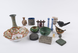 Japanese porcelain fruit bowl, prayer wheel, three Japanese pottery tea bowls, two pottery bowls, two vases, two metal boxes, pewter egg ornament, Chinese bronze dish, Indian miniature ornament, Indian bowl, elephant pipe and pair of blue and white porcelain condiments, 20th century, (19cm high), the tallest vase 19.5cm high