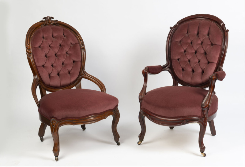 Two antique armchairs, carved walnut with plum velvet upholstery, 19th century,