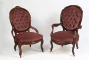 Two antique armchairs, carved walnut with plum velvet upholstery, 19th century,