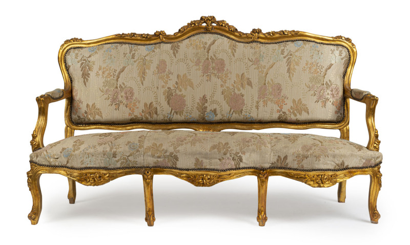 A French carved and gilded settee, 19th century, ​192cm across the arms