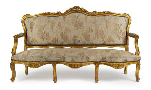 A French carved and gilded settee, 19th century, 192cm across the arms