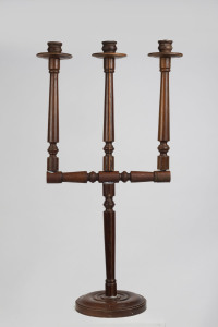 An antique Spanish three branch candelabra, turned walnut, 18th/19th century, 94cm high