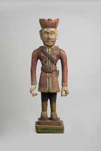 An Indian statue, polychrome and carved timber, early 20th century, 84cm high