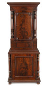 A Georgian clock stand cabinet, flame mahogany with turned columns, circa 1800, 171cm high, 68cm wide, 41cm deep