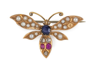 Antique gold butterfly brooch set with diamonds, rubies, sapphire and seed pearls, circa 1900, ​4cm wide, 5 grams total