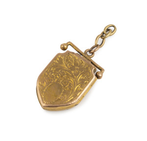 An antique 15ct gold shield shaped locket pendant, 19th century, ​4cm high, 11.5 grams