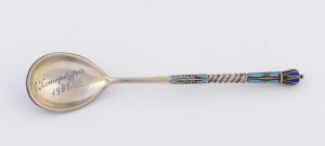 An Imperial Russian silver and enamel spoon, circa 1909, stamped "84", makers mark illegible, 1909 dated inscription on the bowl, 11cm long, 16 grams