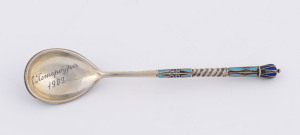 An Imperial Russian silver and enamel spoon, circa 1909, stamped "84", makers mark illegible, 1909 dated inscription on the bowl, 11cm long, 16 grams