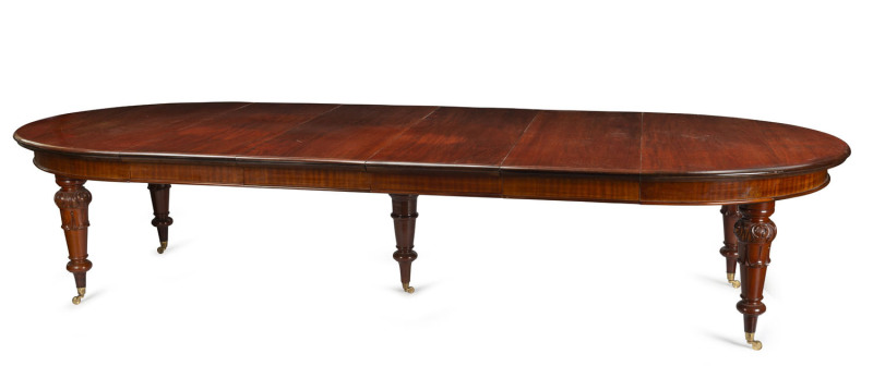 A fine English extension dining table, carved mahogany and brass castors with four additional leaves, 19th century, purchased in 1987 for $18,000 (Acorn Antiques, Melbourne), 77cm high, 165cm wide (extends to 365cm), 148cm deep