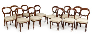 Twelve mahogany balloon back dining chairs, English