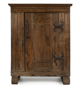 An antique single door cupboard, carved oak with peg joint construction and hand wrought iron hinges, 17th century, 102cm high, 79cm wide, 51cm deep