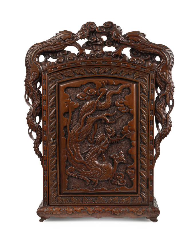 A Chinese tabletop cabinet with finely carved dragon motif, 19th century, 57cm high, 42cm wide, 18cm deep