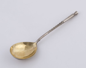 A Russian silver spoon with gilt wash finish, reverse engraved with the Roman numerals "XXV" in floral design, 19th century, ​17.5cm long, 43 grams