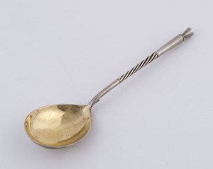 A Russian silver spoon with gilt wash finish, reverse engraved with the Roman numerals "XXV" in floral design, 19th century, 17.5cm long, 43 grams