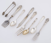 Russian silver servers, Continental silver tongs, three silver spoons and two silver serving forks 19th and early 20th century, (8 items), the largest 19cm long, total weight (minus the Russian servers) 175 grams