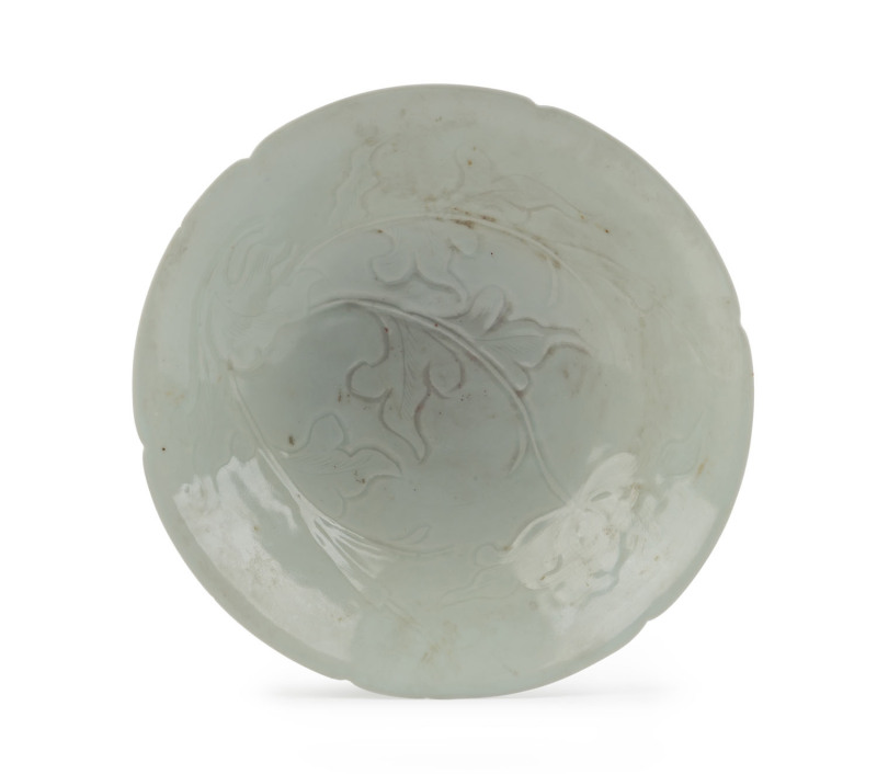 A Chinese fine porcelain bowl of lobed design with incised floral decoration, early Song Dynasty, 11th century, 5.5cm high, 19cm diameter. PROVENANCE: The Joshua McClelland Collection, Melbourne