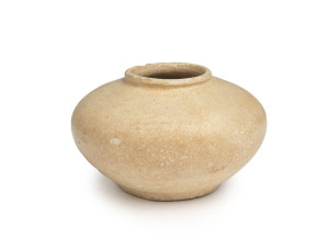 A Vietnamese pottery vessel with cream glaze, 16th century, 5.5cm high, 8.5cm diameter