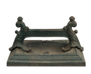 An antique cast iron boot scraper, 19th century, ​37cm wide