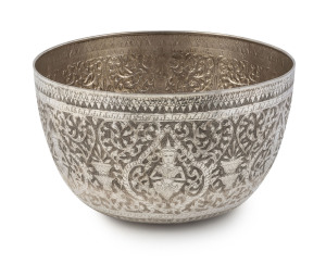 An Asian coin silver bowl, Burmese or possibly Thai, 20th century, 14cm high, 25cm diameter, 520 grams